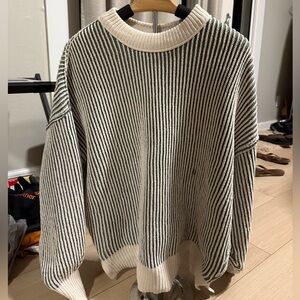 Green and white sweater, barely worn but small snag in the front